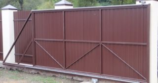 Купить откатные ворота из профнастила Заинск, цена от 1780 руб.
