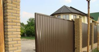 Купить откатные ворота из профнастила Заинск, цена от 1780 руб.